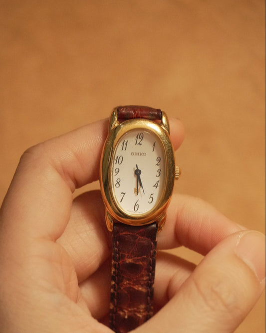 1985 Seiko cartier baignoire like oval gold tone quartz watch 1f21-5b70