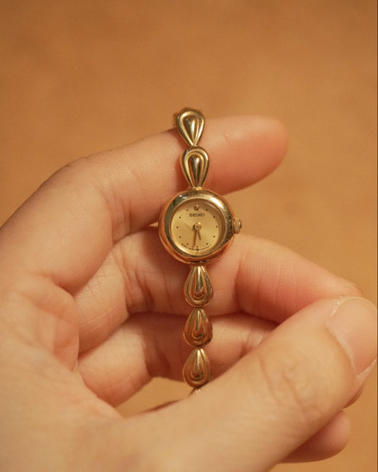 1987 Seiko water drop gold tone quartz watch 1e20-0540