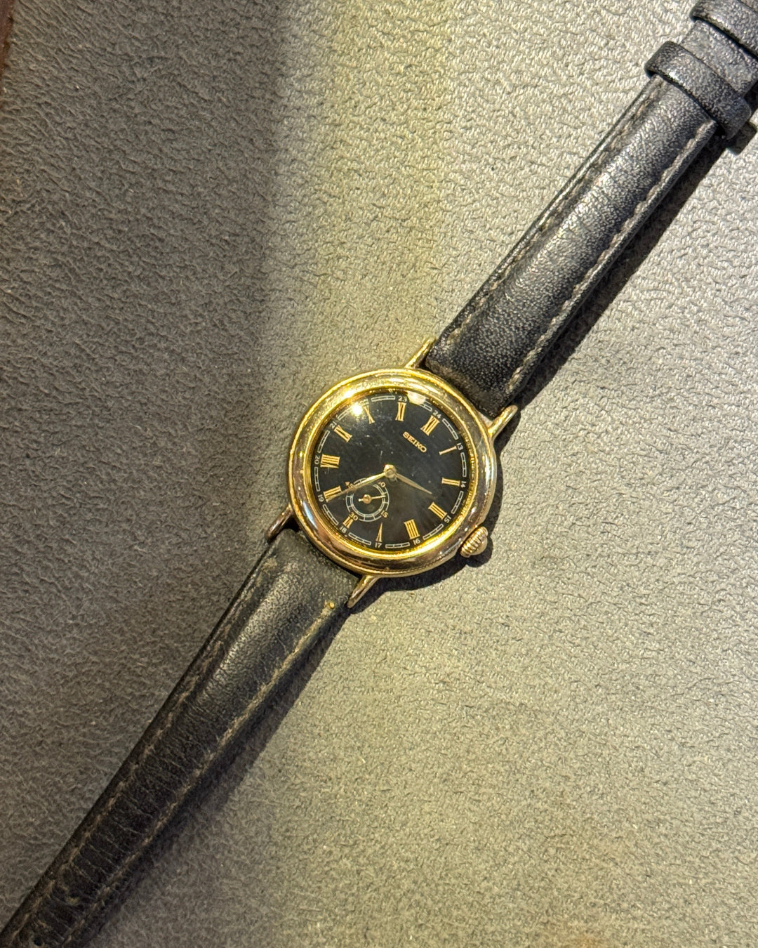 1985 Seiko Small second black gold dial quartz watch 2g38-0100