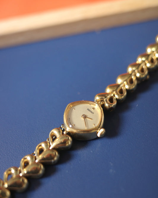 Vintage Seiko 1996 Ladies Gold-Tone Heart Pattern Quartz Watch 1e20-5280