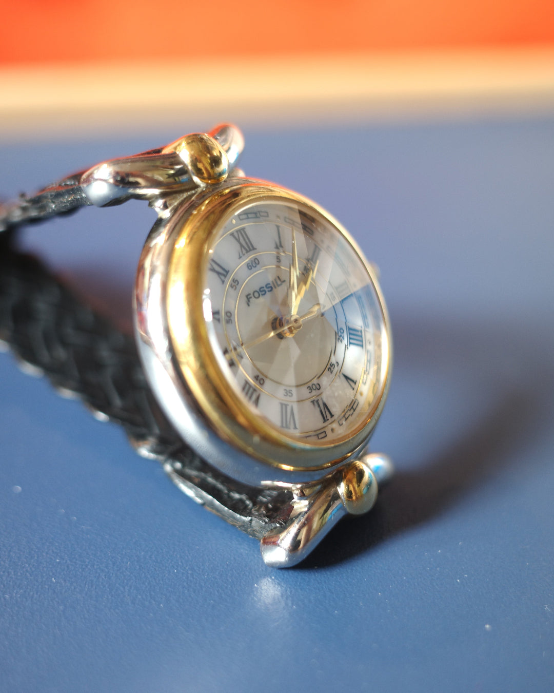 Fossil Diamond cut Prism Glass White face Roman Numerals Watch