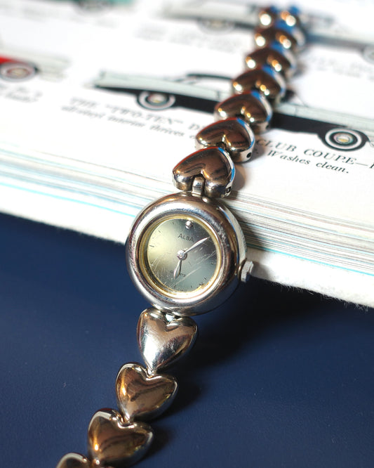 Seiko Alba silver heart shape chain quartz watch v232-0230