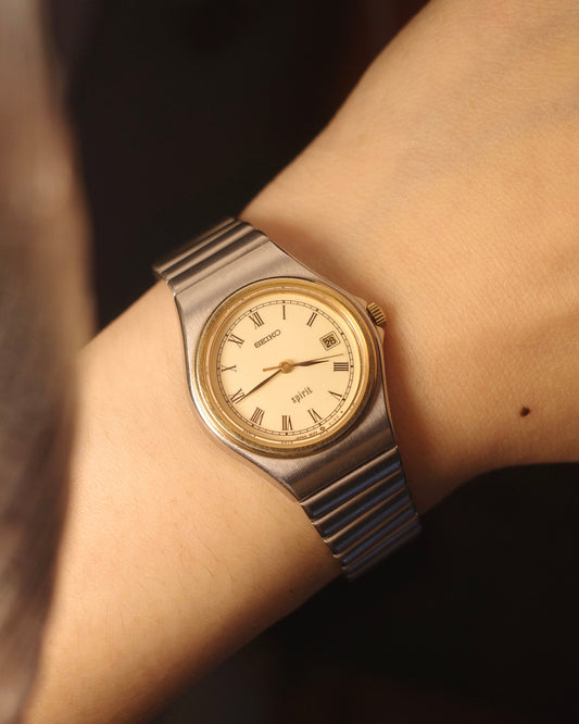 80's Seiko spirit two tone round dail quartz watch 3e22-0100