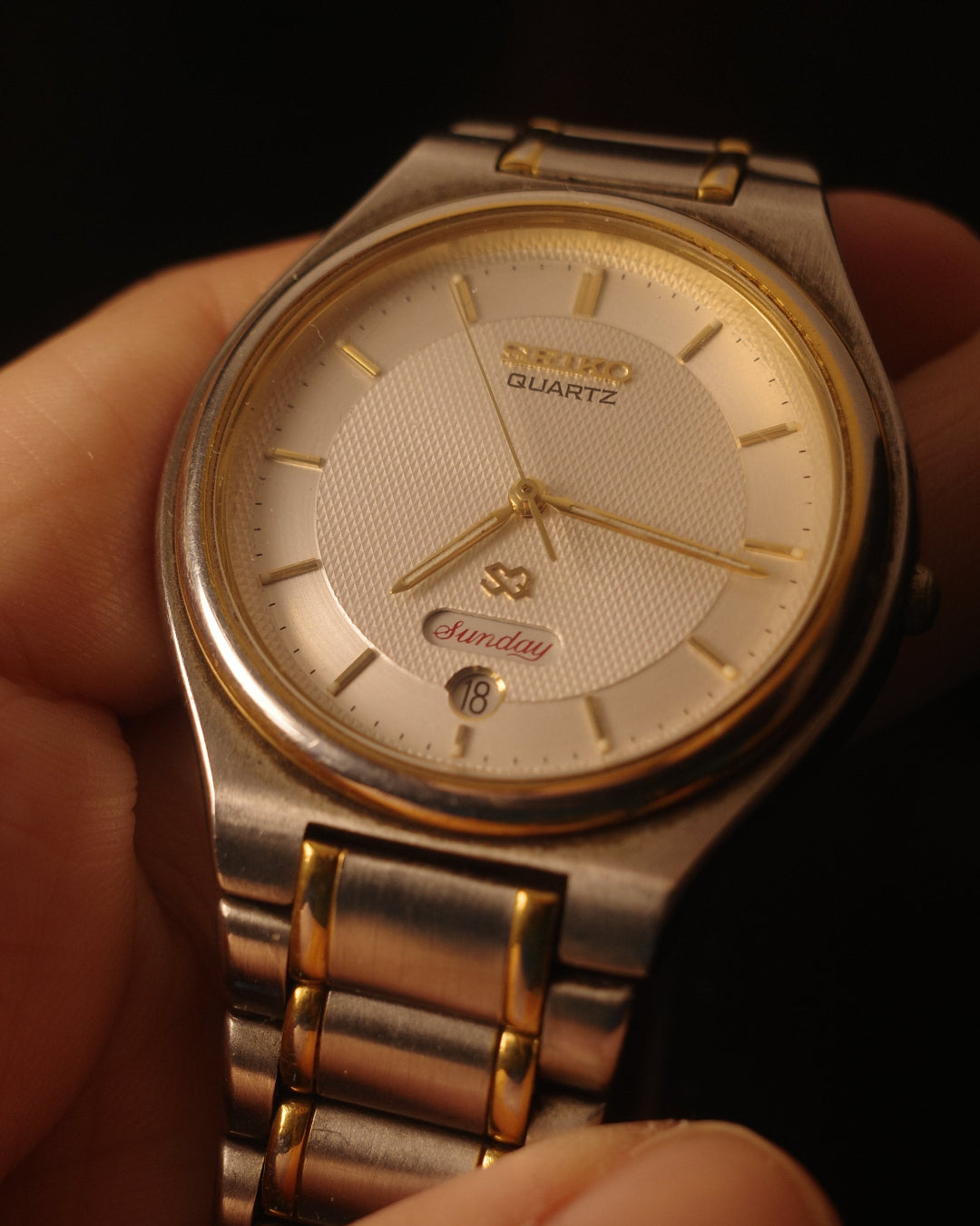 1980's Seiko SQ gold tone date day script font quartz watch