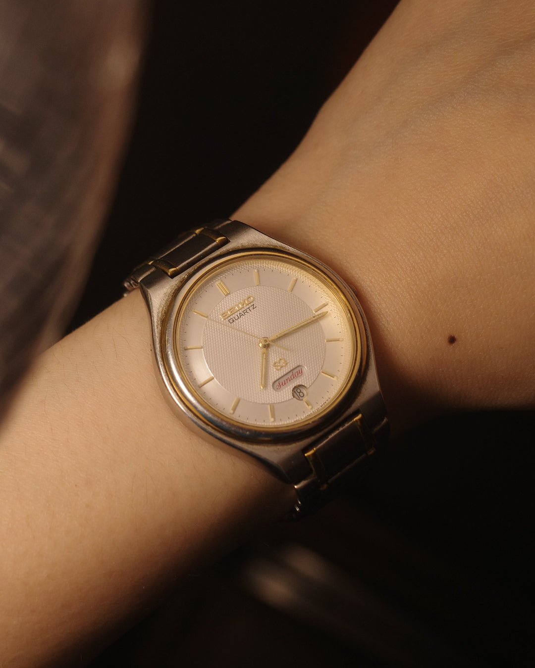 1980's Seiko SQ gold tone date day script font quartz watch