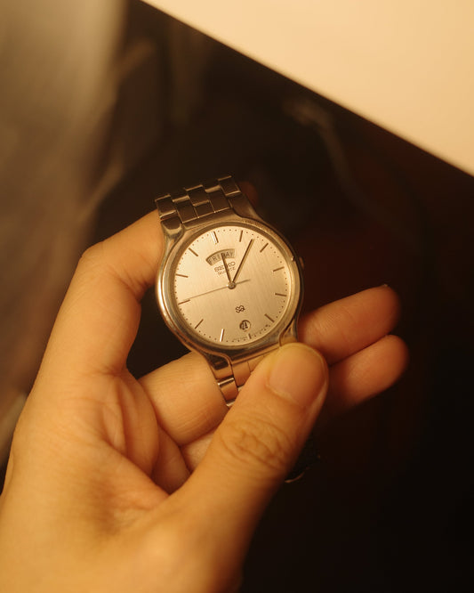 1989 Seiko SQ Silver date day Quartz watch 5Y23-7150