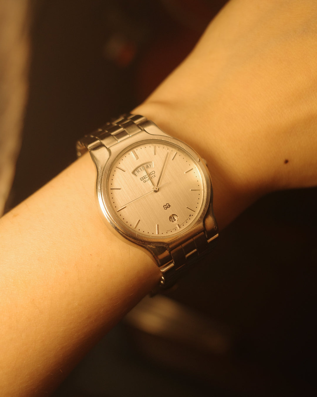 1989 Seiko SQ Silver date day Quartz watch 5Y23-7150