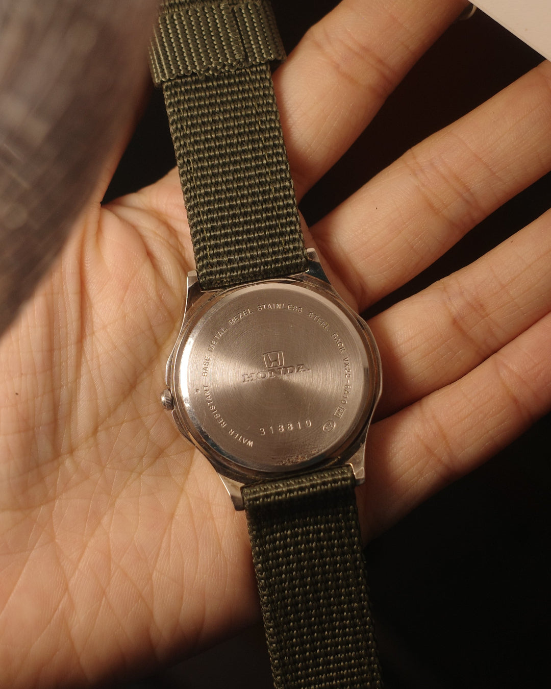 1983 Honda with green strap date Quartz watch
