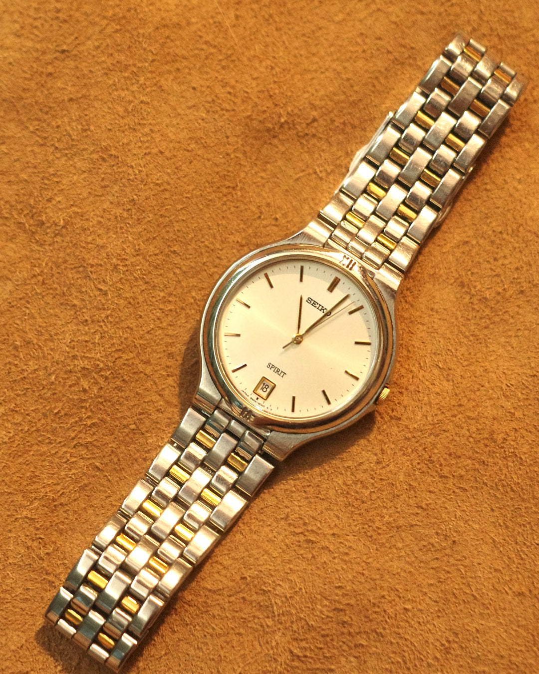 1985 Seiko spirit round dial two tone quartz watch 8n45-604a