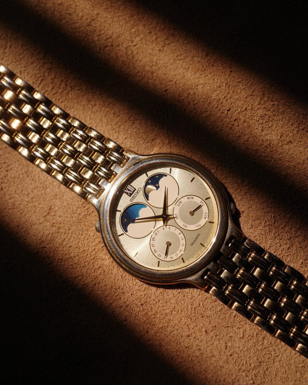 1989 Seiko full calendar gold tone sun moonphase watch 7f18-8a00